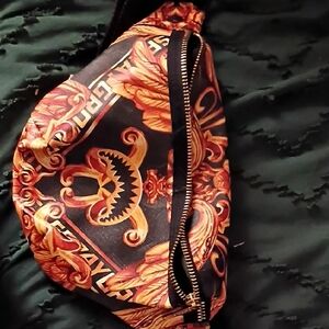 Sprayground Black and Gold Patterned Bag